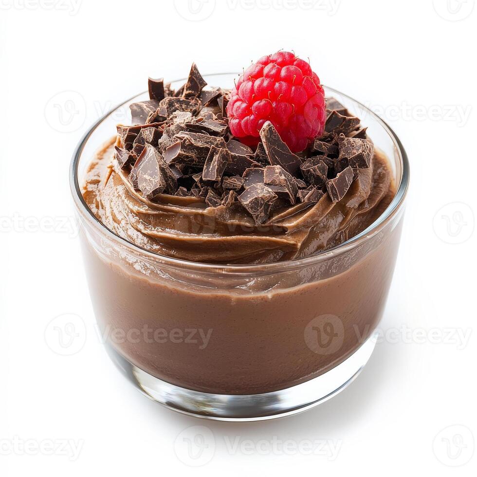 A close-up of a mousse au chocolat, a light and airy chocolate mousse, made with dark chocolate, eggs, sugar, and cream, served in a glass or ramekin, garnished with chocolate shavings and a raspberry, showcasing the smooth texture and the intense chocola photo