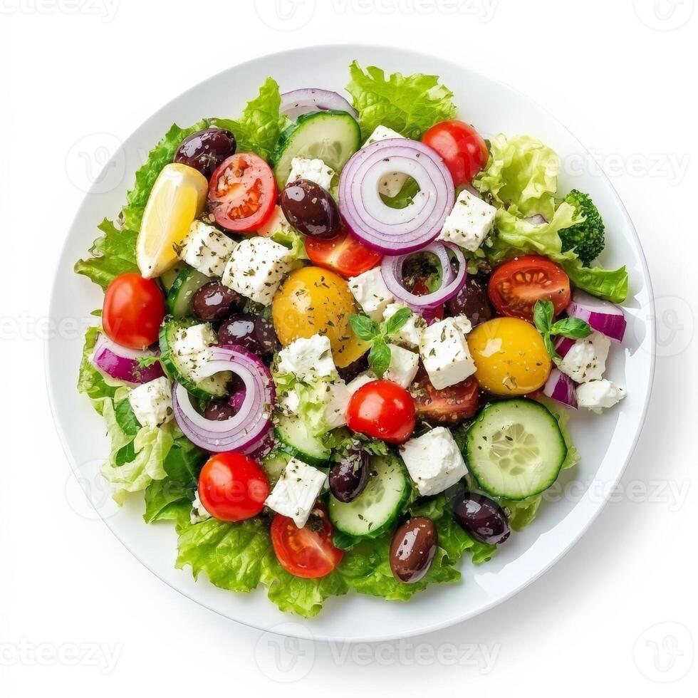 A colorful Greek salad with crisp lettuce, cucumbers, cherry tomatoes, Kalamata olives, red onions, feta cheese, and a lemon-oregano dressing. A Mediterranean delight. Isolated on clean white background photo