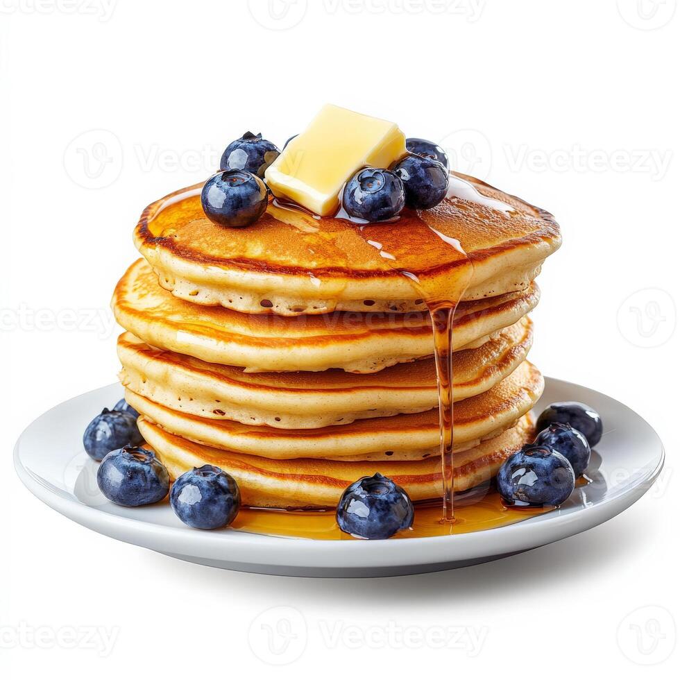 A stack of fluffy pancakes drizzled with golden maple syrup, topped with a pat of melting butter and a handful of fresh blueberries. The layers are perfectly even, making for an irresistible breakfast treat. Isolated on clean white background photo