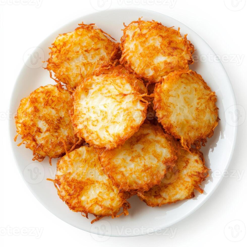 A plate of baked potato crisps on a white background photo