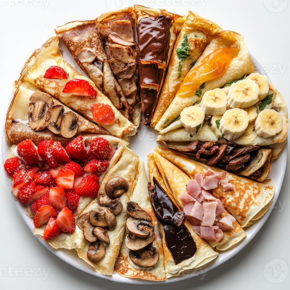 A plate of crepes with various toppings photo
