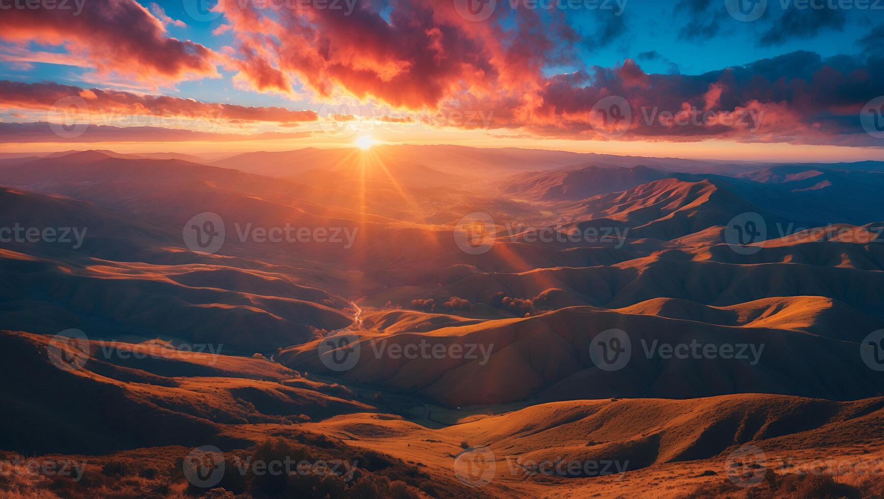 Rolling Hills Landscape at Sunset with Vibrant Clouds and Golden Light photo