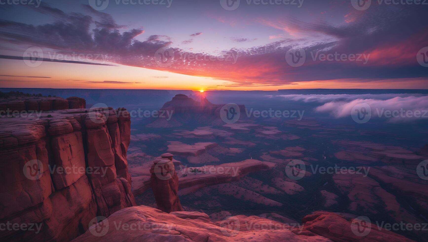 Dramatic Sunrise Over Rocky Canyon Landscape with Cloud Inversion Layer photo