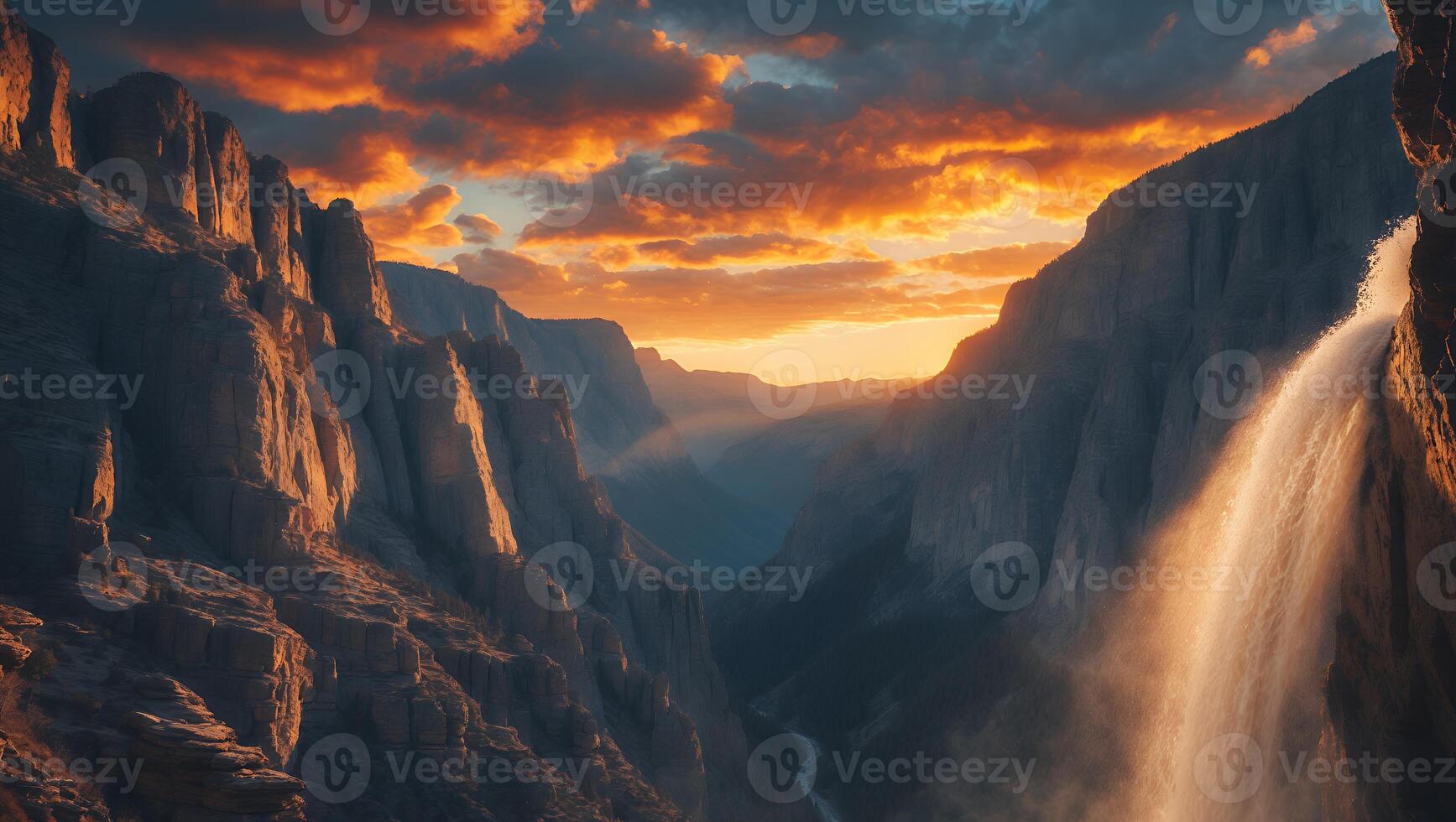 Waterfall Flows in Rocky Canyon at Dusk with Dramatic Sky Clouds photo