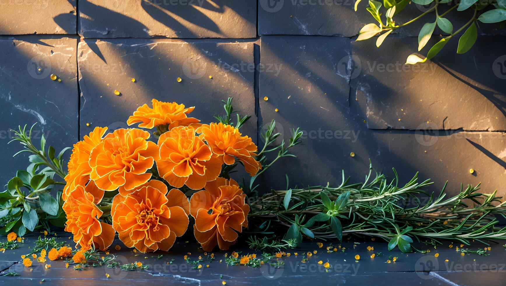 Orange Flowers Arrangement with Rosemary and Greenery on Dark Tile photo
