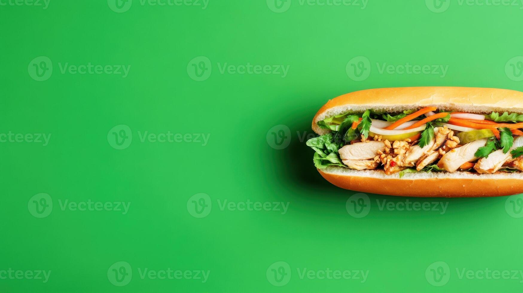 Chicken sandwich with pickled vegetables on green background for lunch menu promotion photo