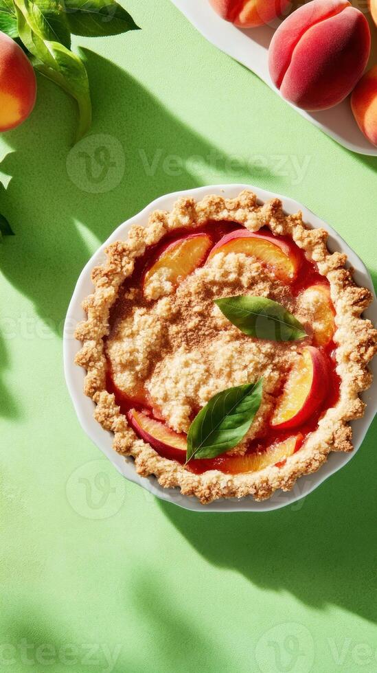 Peach pie, overhead view, on light green, for food blogs, recipe websites, food content photo