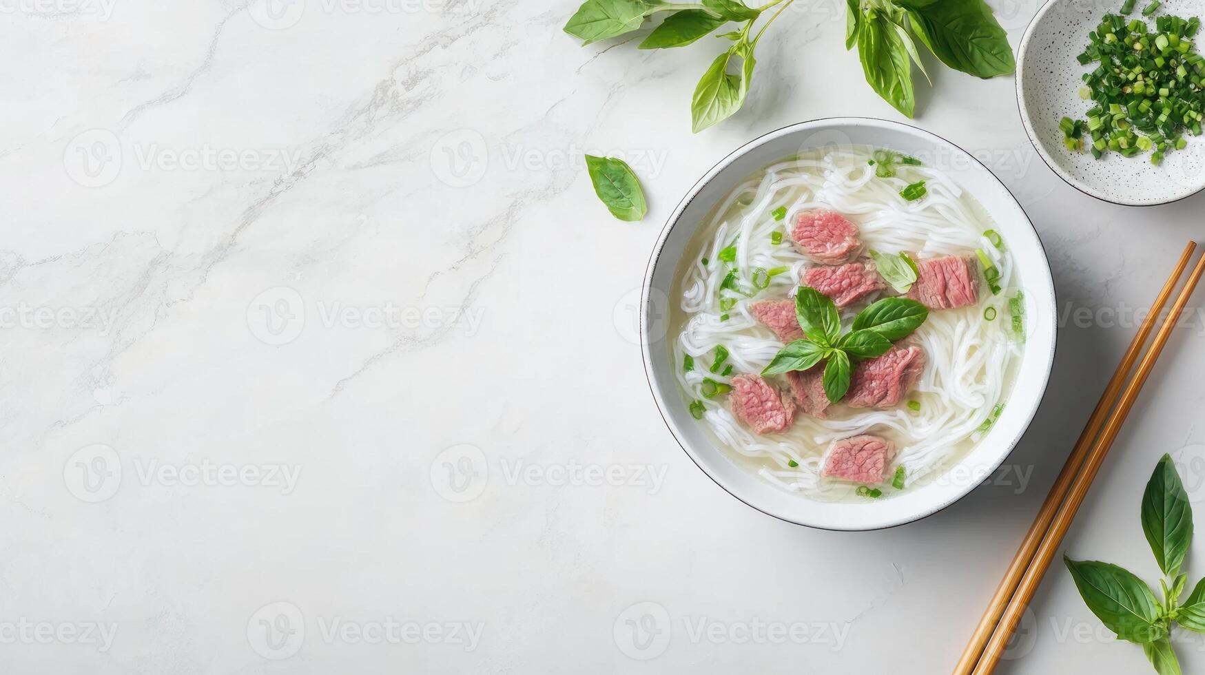 Pho served with beef and basil leaves on a table, used for menu, restaurant advertisements photo