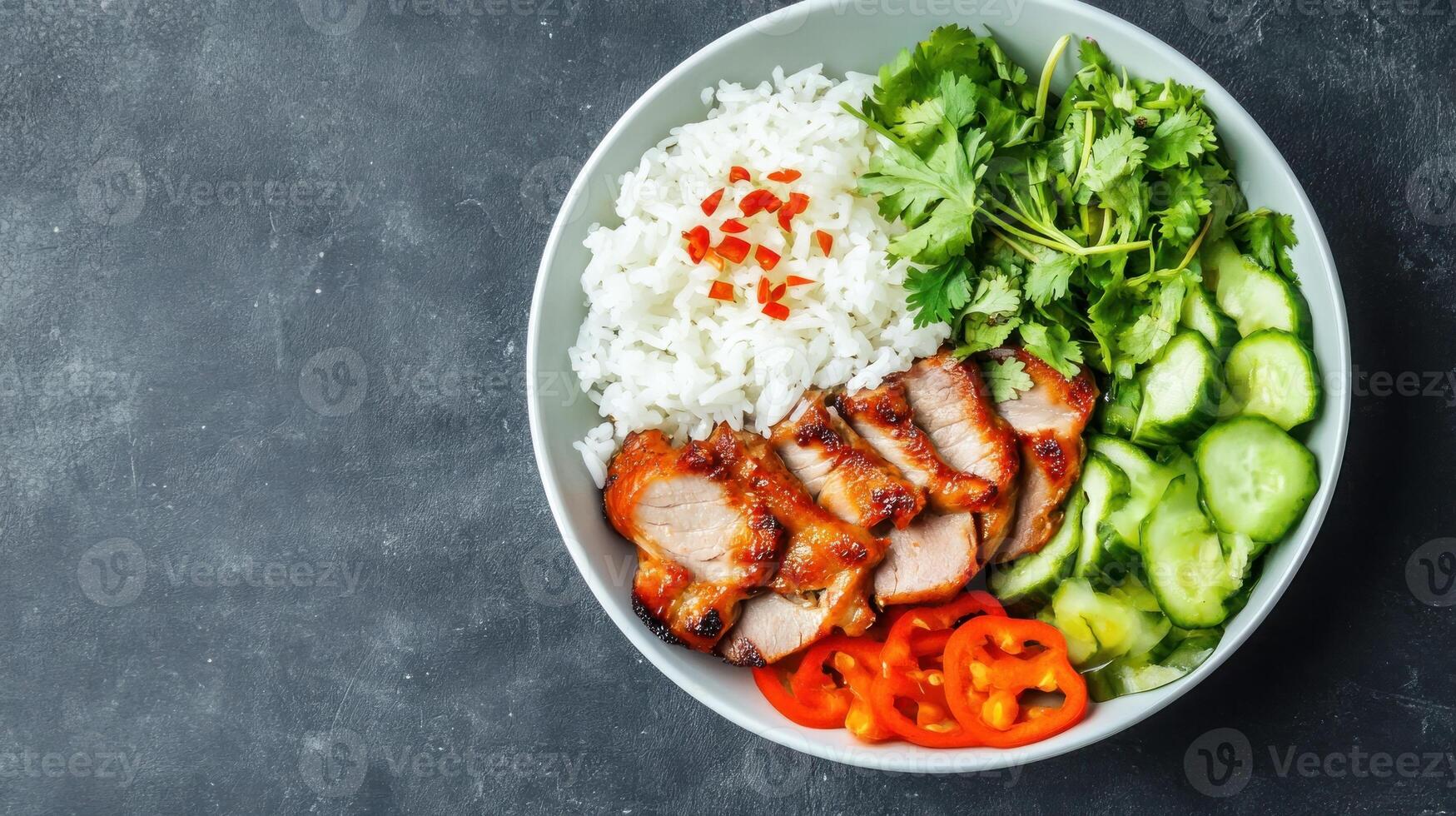 beef with rice, herbs, and vegetables in a bowl. Ready for a quick lunch or dinner recipe photo