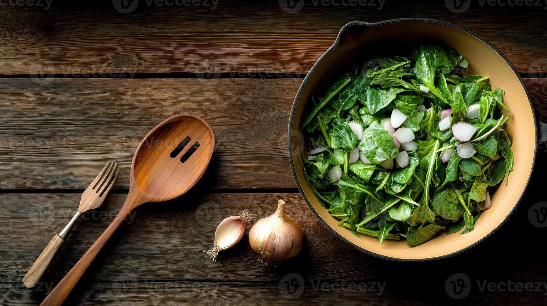 Preparing greens in pan on wood for a healthy meal with garlic and spoon aside, suitable for food blog photo