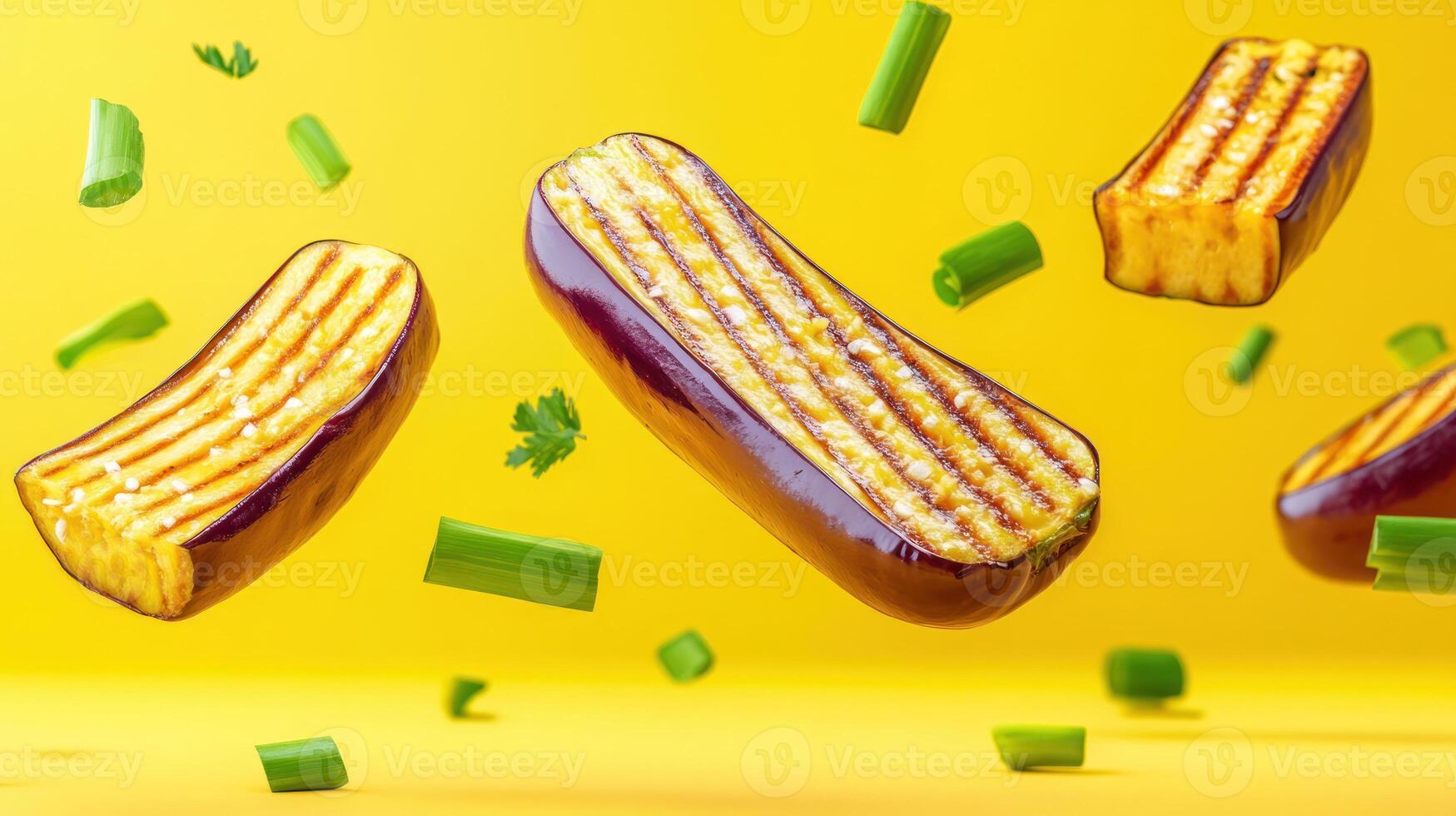 Sliced eggplants and spring onions levitating on a yellow background, used for cooking photo
