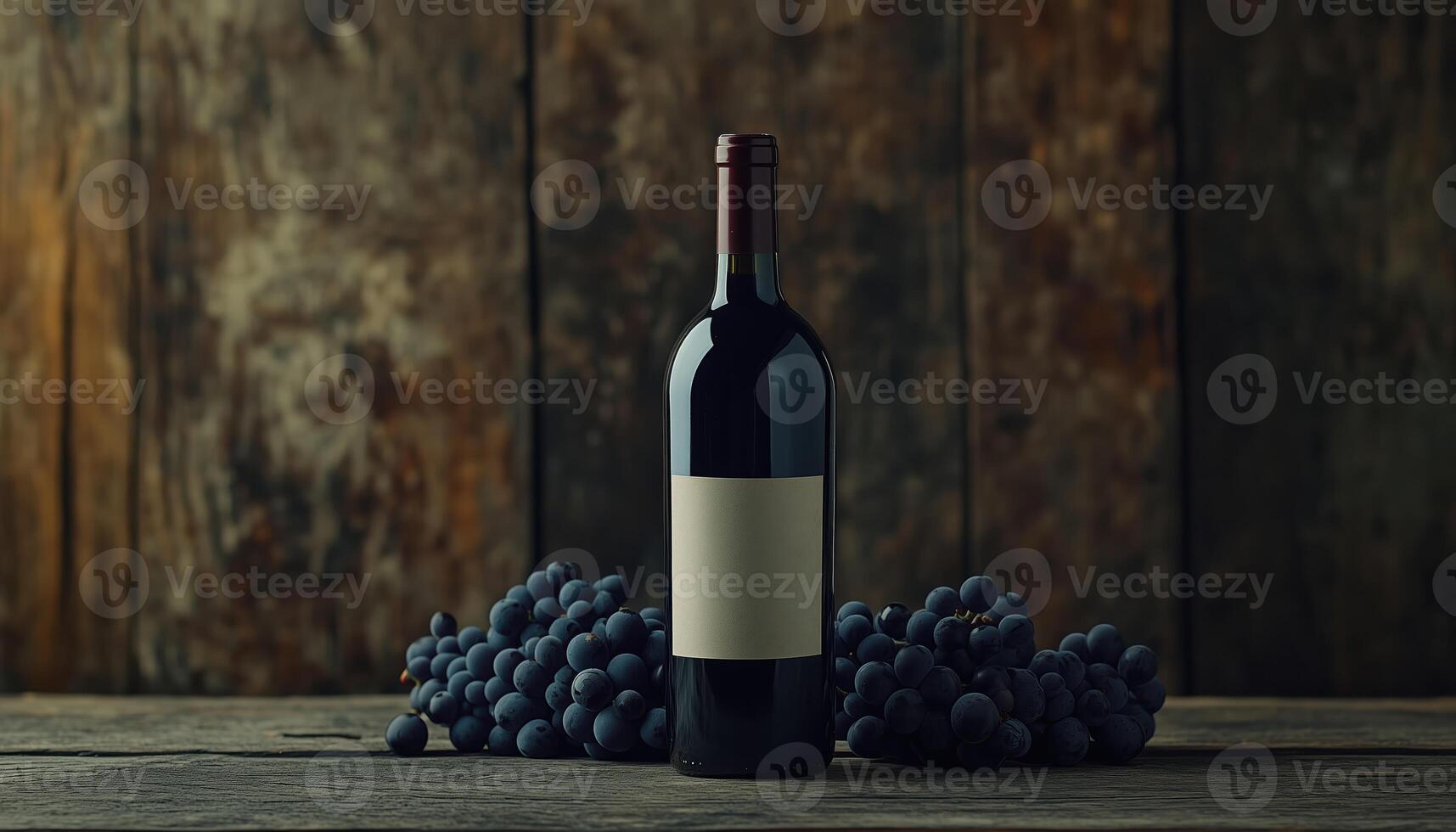 Red Wine Bottle And Blue Grapes On Antique Wooden Table With Vintage Label And Space For Text. Vintage Feel. Rich Colors photo