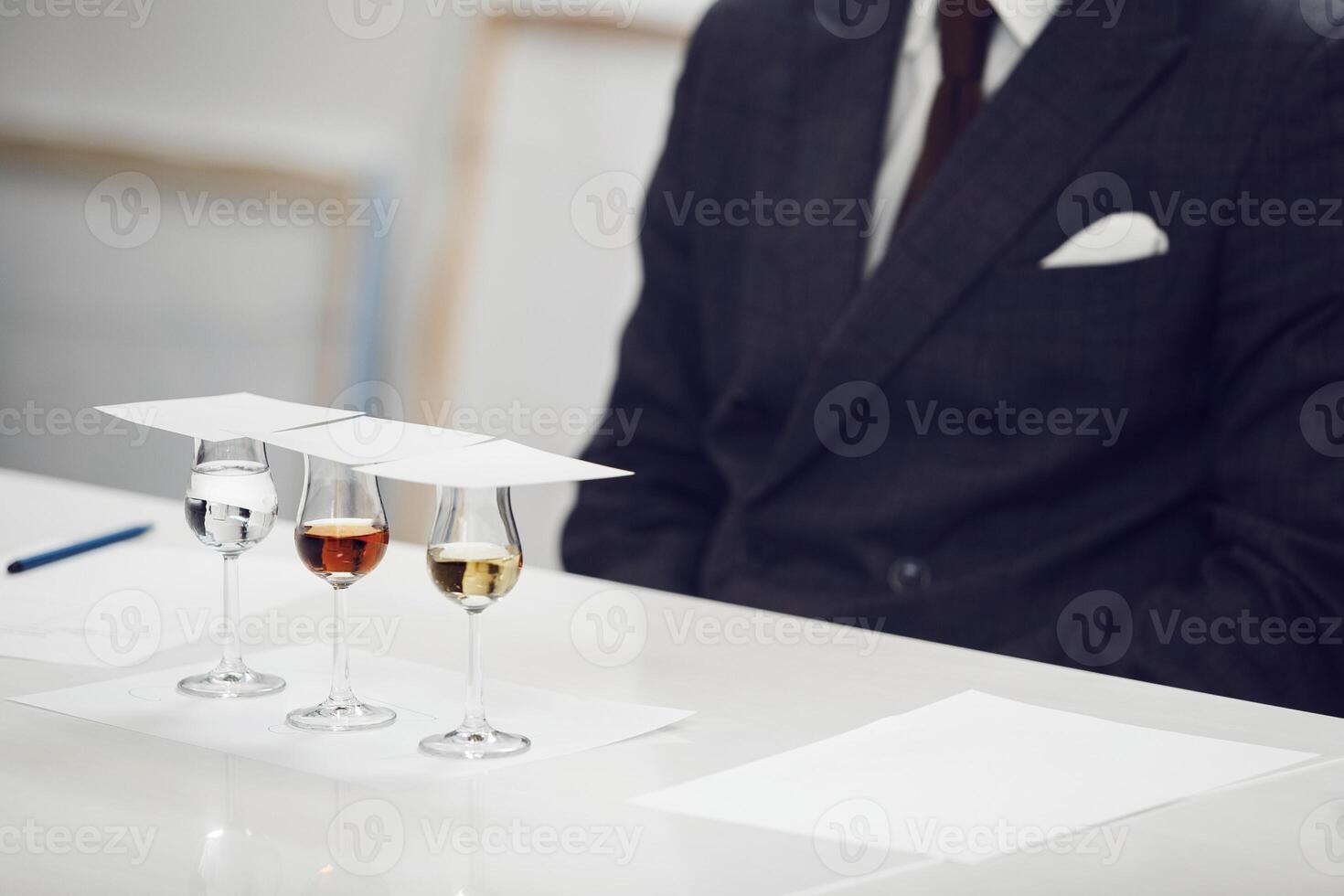 Sophisticated Spirits Tasting Event, Close up. Degustation Glasses with Various Untitled Alcoholic Drinks on the Table. photo