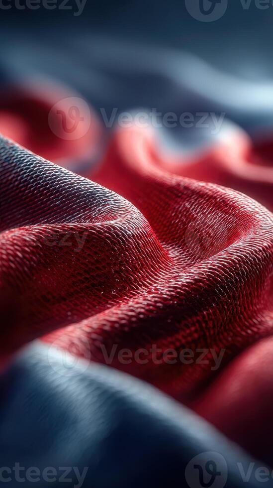 Textured fabric draped elegantly with rich colors, showcasing waves and folds in intricate detail photo