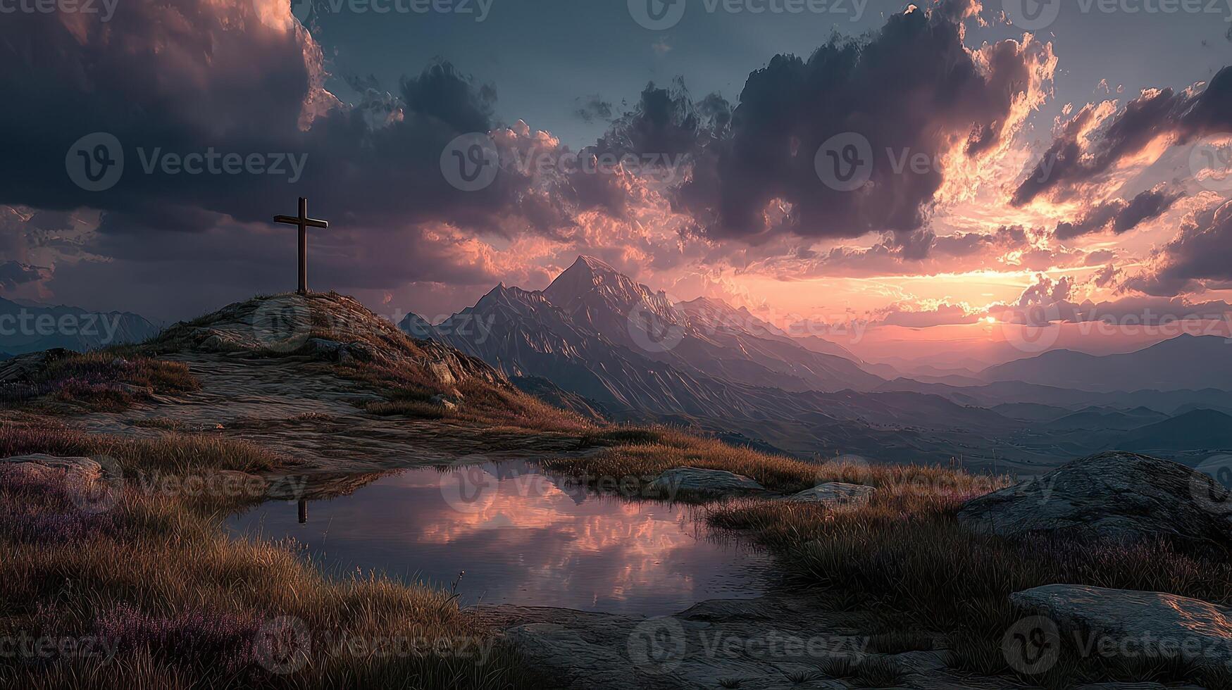 Vibrant sunset illuminates mountain landscape with cross and reflective water in serene setting photo