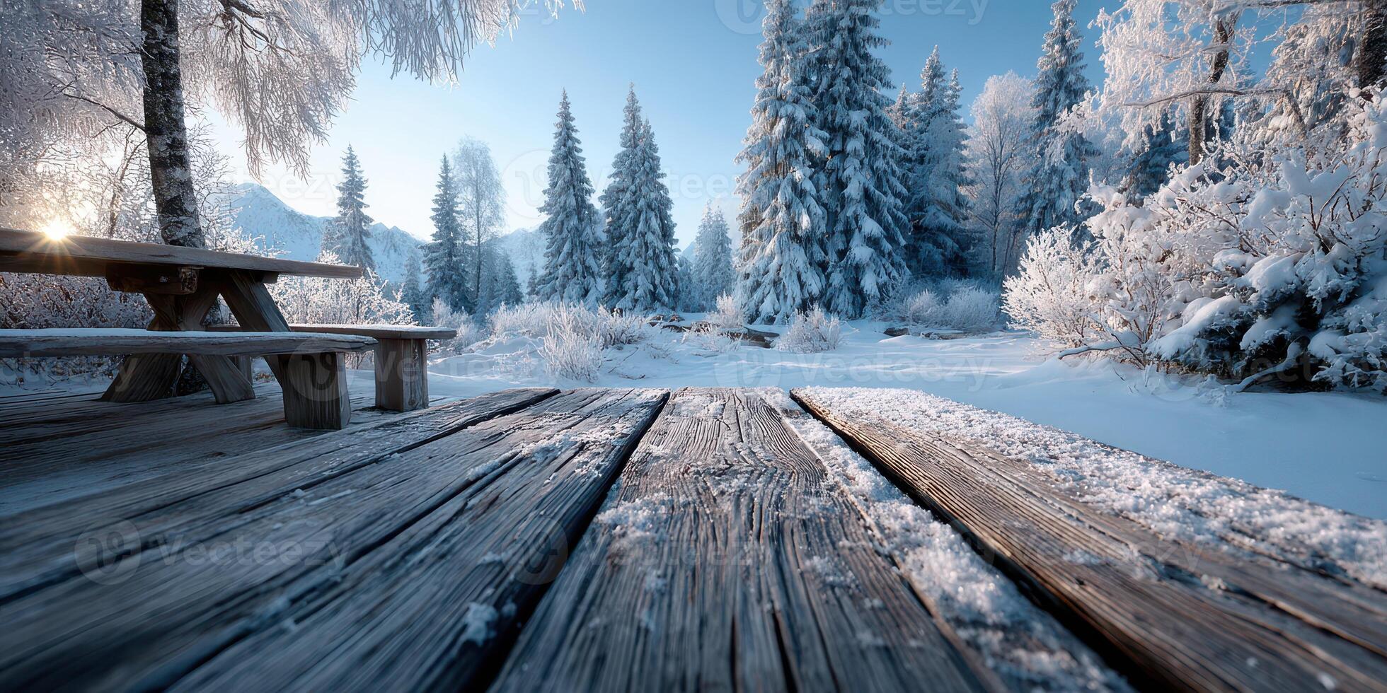 Winter landscape with snowy trees and wooden deck in a serene mountain setting at dawn photo