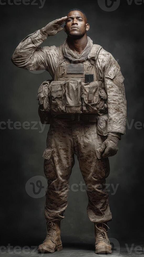 Military member in camouflage uniform saluting with pride in a solemn indoor setting at dusk photo