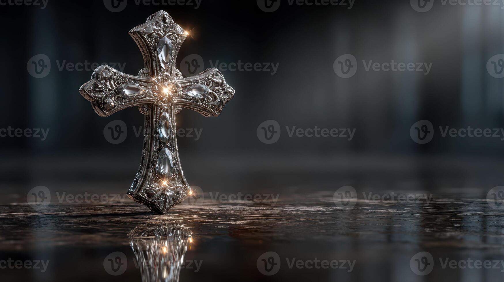 Intricate silver cross glows softly on a reflective surface in a dimly lit space, conveying a sense of serenity and spirituality photo