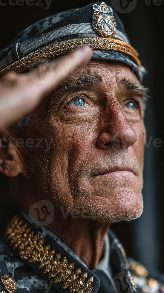 Elderly military officer salutes with pride in traditional uniform during ceremony in a ceremonial hall photo