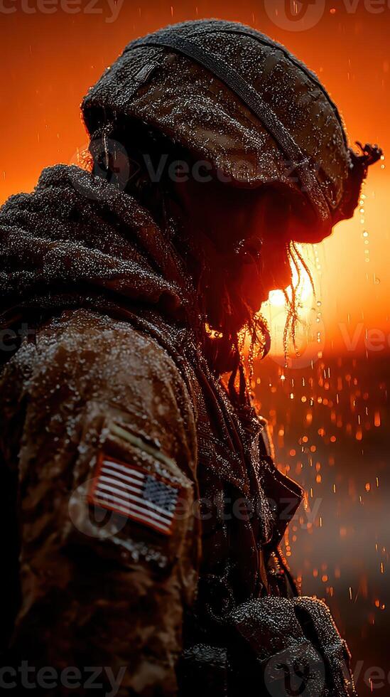 Soldier stands in rain as sunset illuminates the sky, showcasing resilience and determination amidst the elements photo