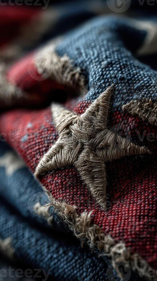 Old fabric with embroidered stars and stripes displays texture and detail in a patriotic theme during daylight photo
