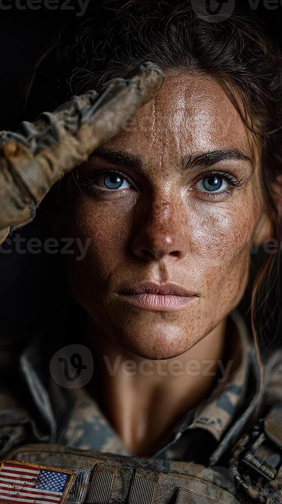 Brave soldier saluting with intense focus and determination in a military setting photo