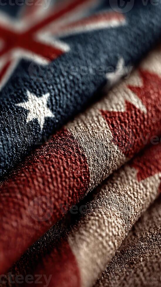 Textiles displaying American and Australian flags with rich colors and textures folded together in close-up photo