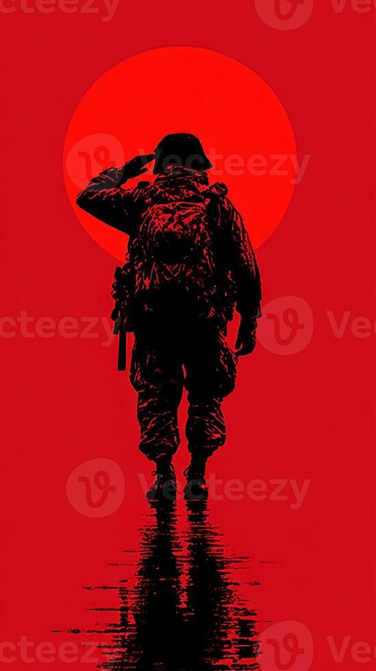 Soldier saluting against a bold sunset backdrop in a moment of reflection photo