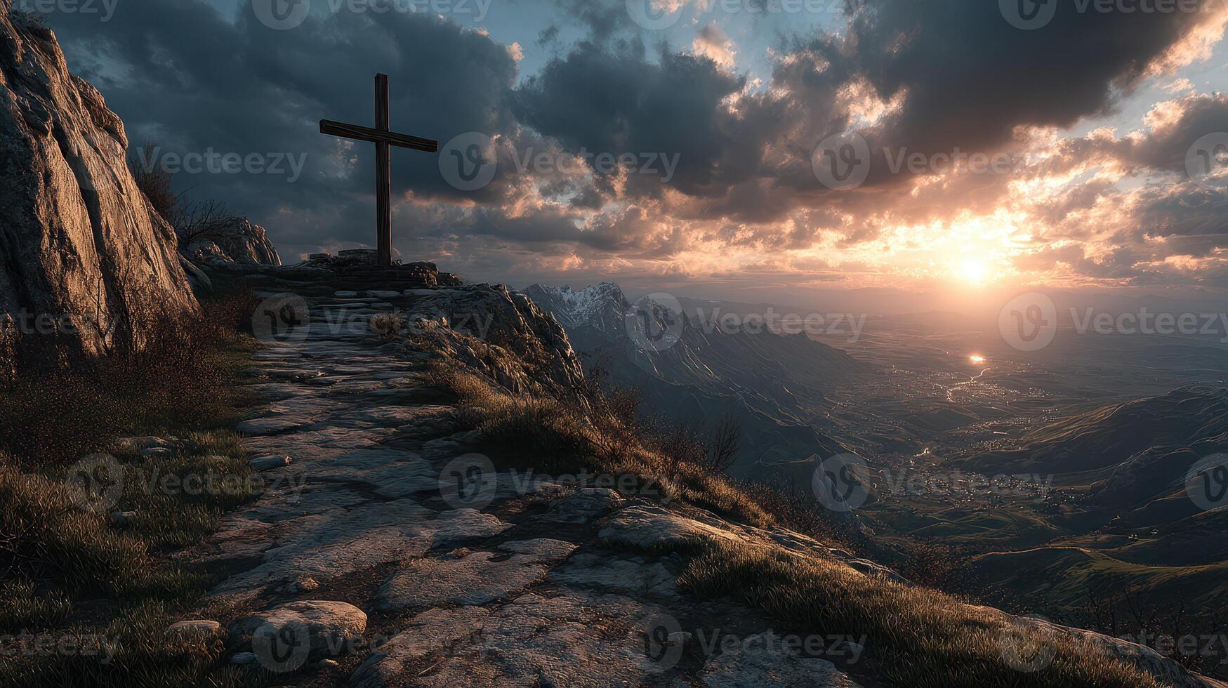 Scenic sunset view with a cross on a rocky hilltop overlooking a valley and mountains photo