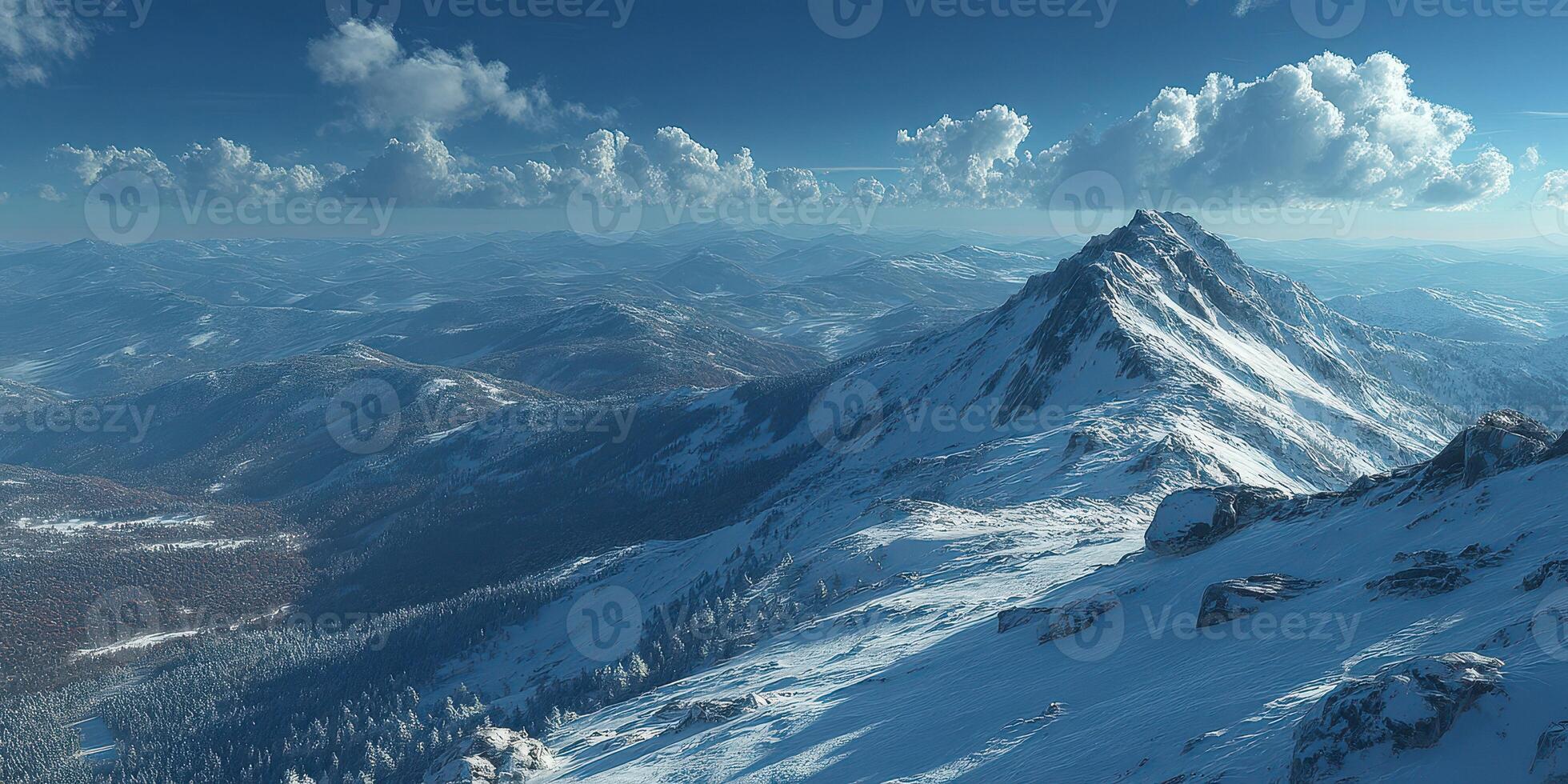Snow-capped mountain peak rises above a vast winter landscape at midday under a clear blue sky adorned with fluffy clouds photo