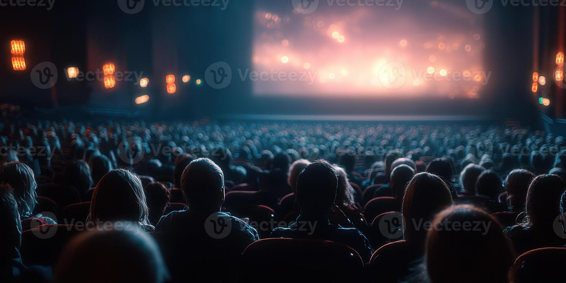 Crowd watches captivating performance in theater during evening show photo