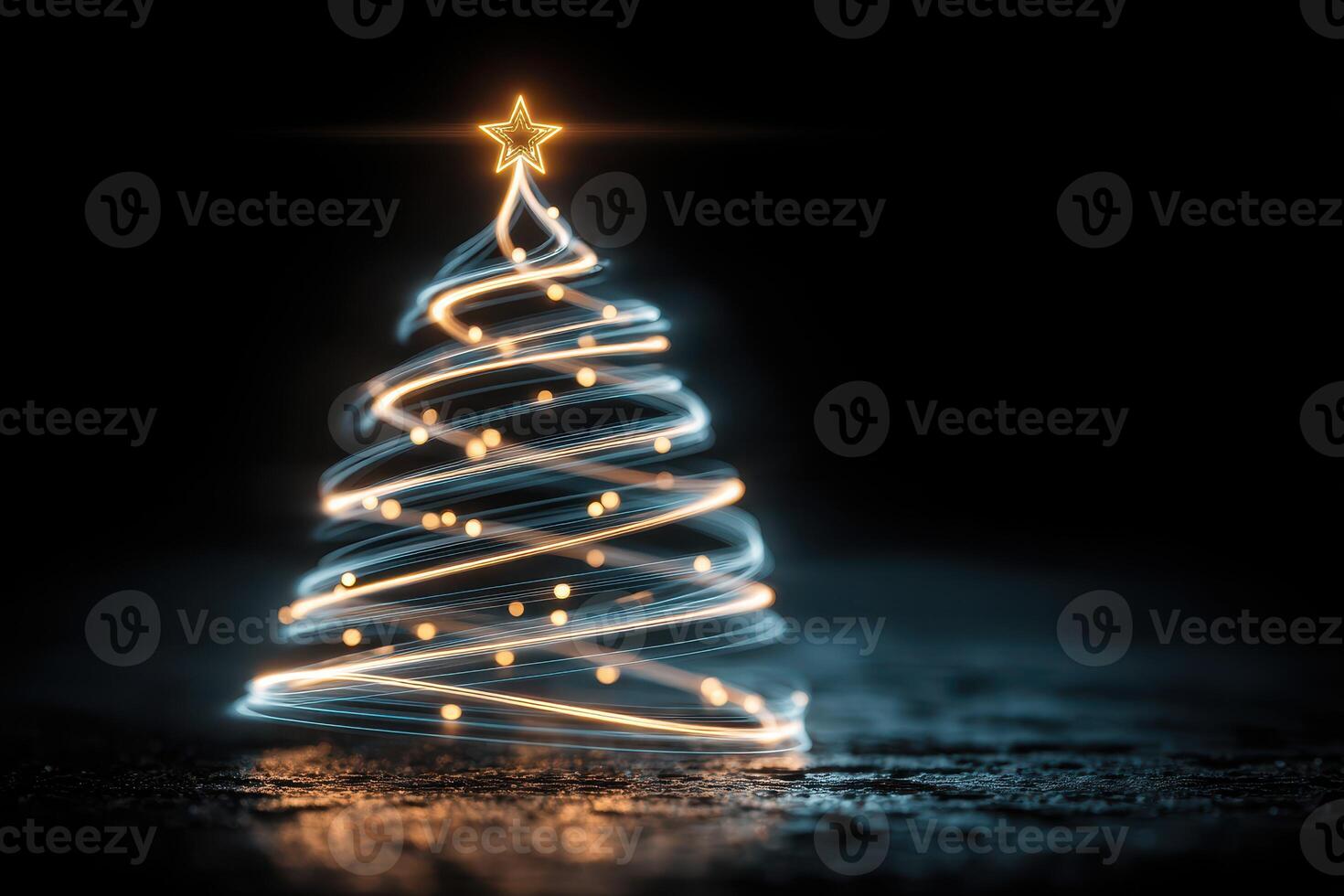 Lighted Christmas tree with glowing star and bright decorations in a dark setting during the holiday season photo