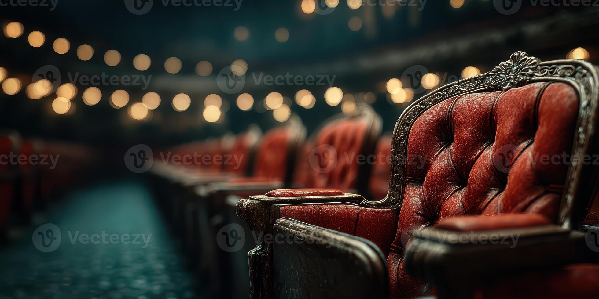 Vintage red theater chairs create an inviting atmosphere in a historic venue before a performance photo