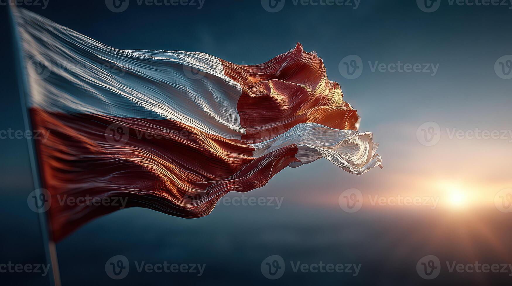 Polish flag waving proudly against a dramatic sky during sunset photo