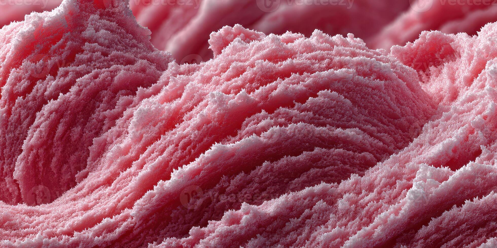 Abstract representation of pink sugar crystals resembling waves under a magnifying lens in an artistic display of texture and color photo