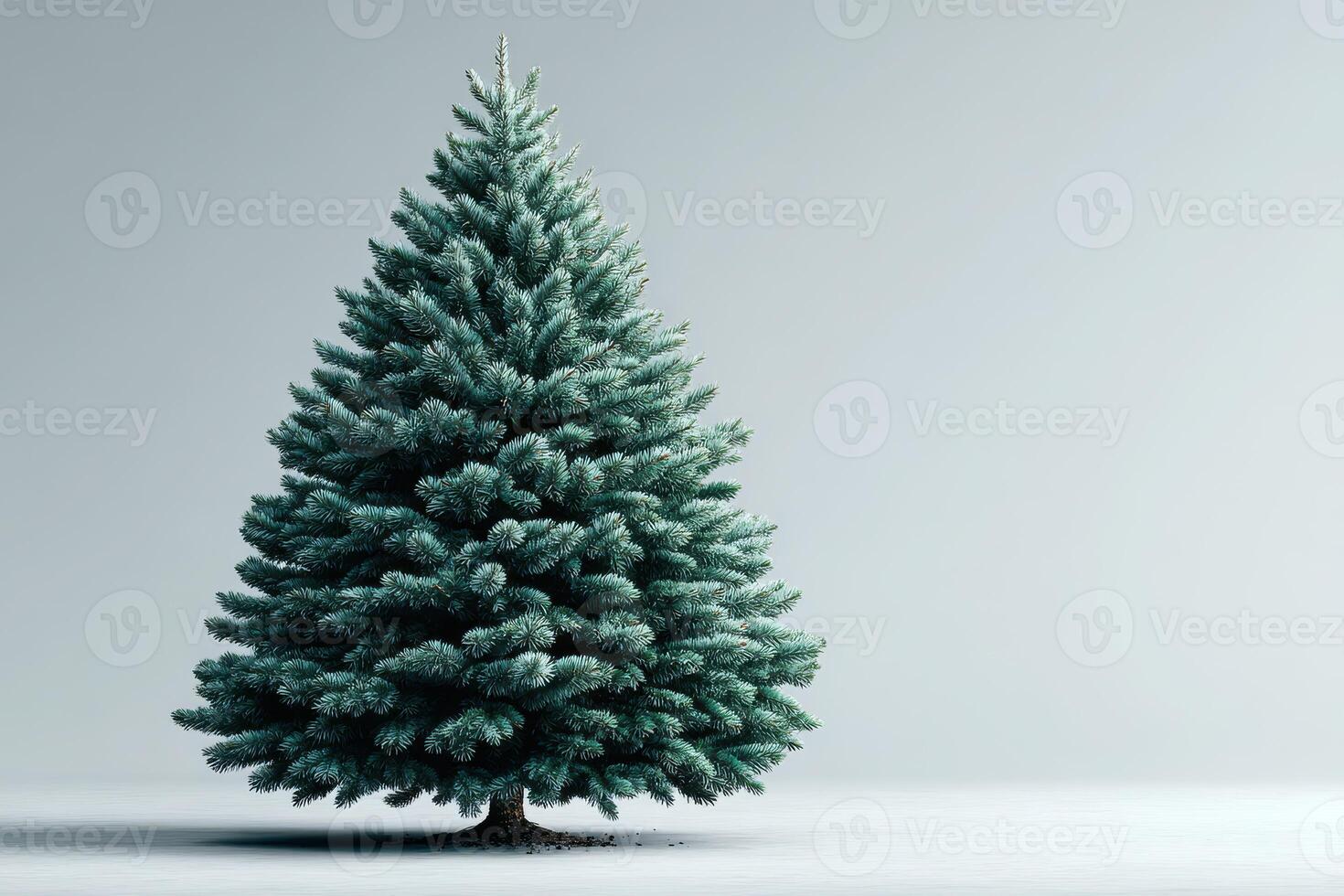 Artificial evergreen tree standing alone in a well-lit room during winter season photo