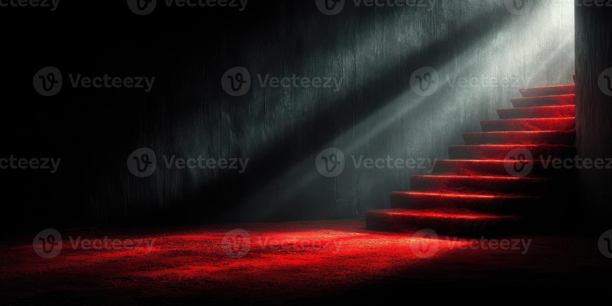 Light streams down a dark staircase creating a dramatic atmosphere with red lighting in the background photo