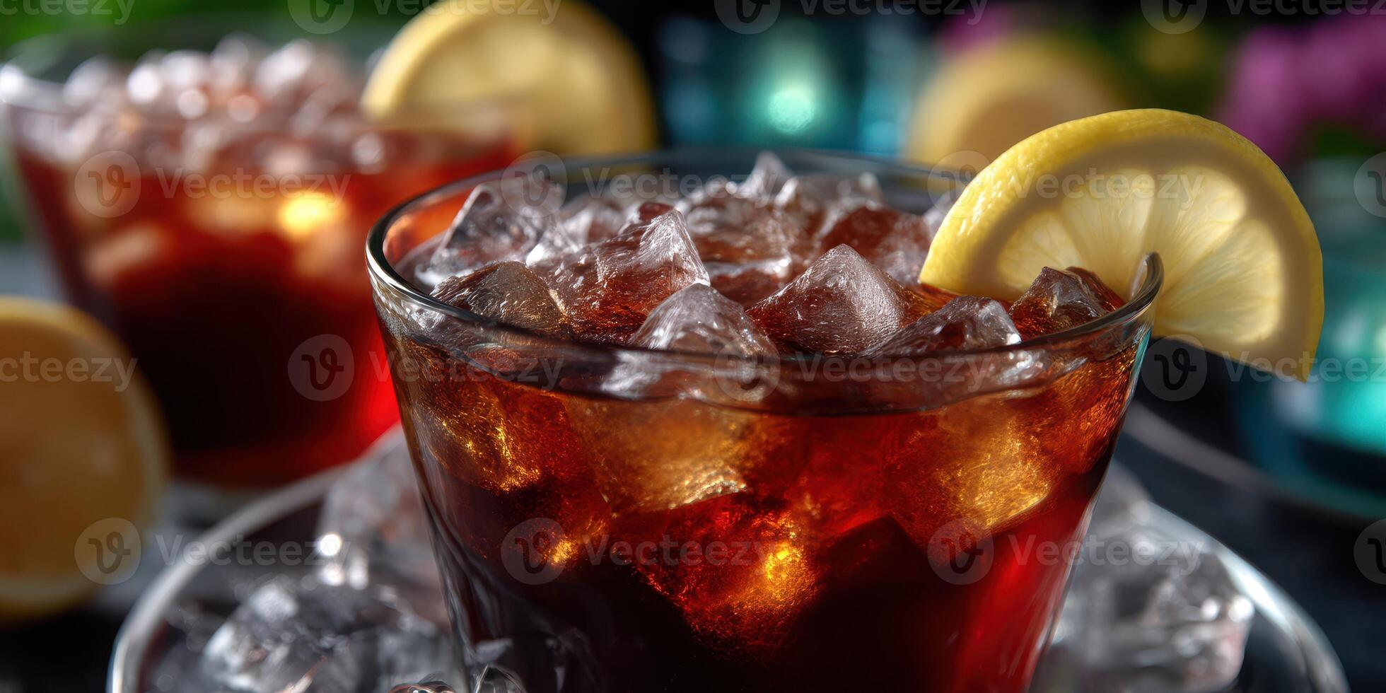 Refreshing iced beverage with lemon garnish served in a glass amidst colorful background photo