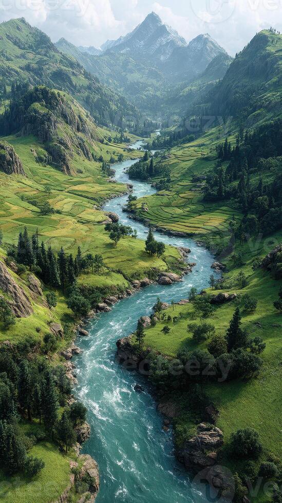 Serene river winding through lush valleys and mountains under a clear sky in a remote landscape photo