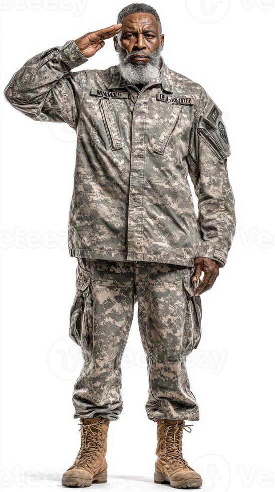 Military personnel saluting with pride in camouflage uniform and boots against a neutral background photo