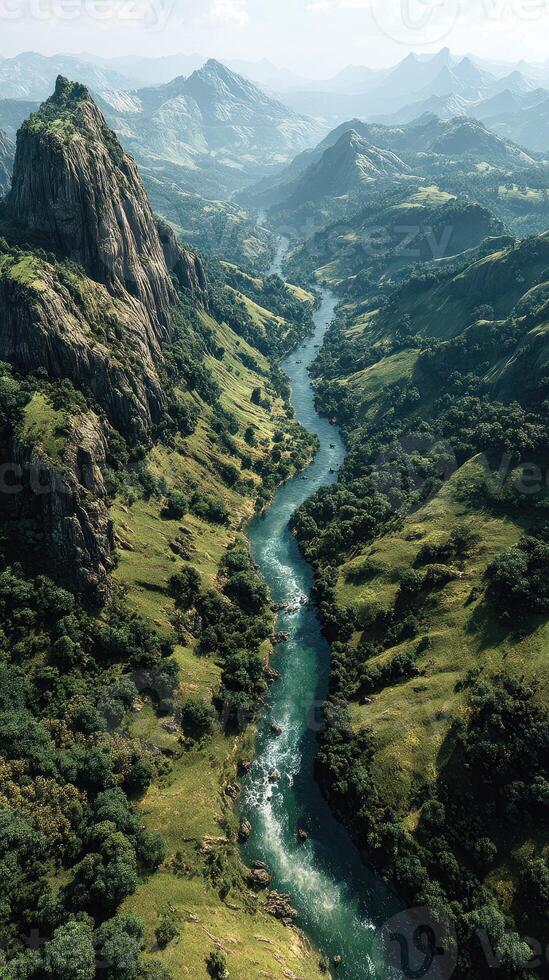 Lush green hills and winding river create breathtaking landscape in remote mountainous region during daytime photo