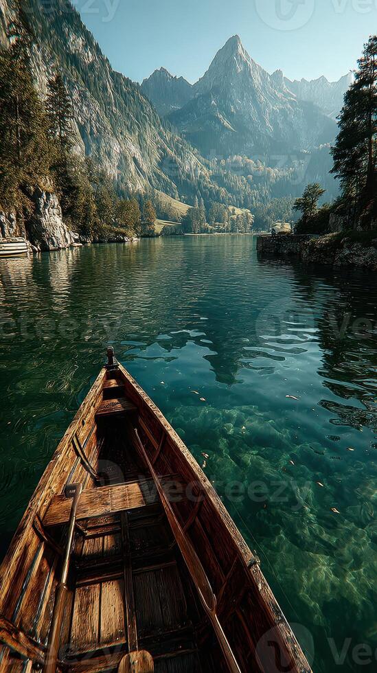 Serene boat ride on a calm lake surrounded by majestic mountains during the early morning light photo