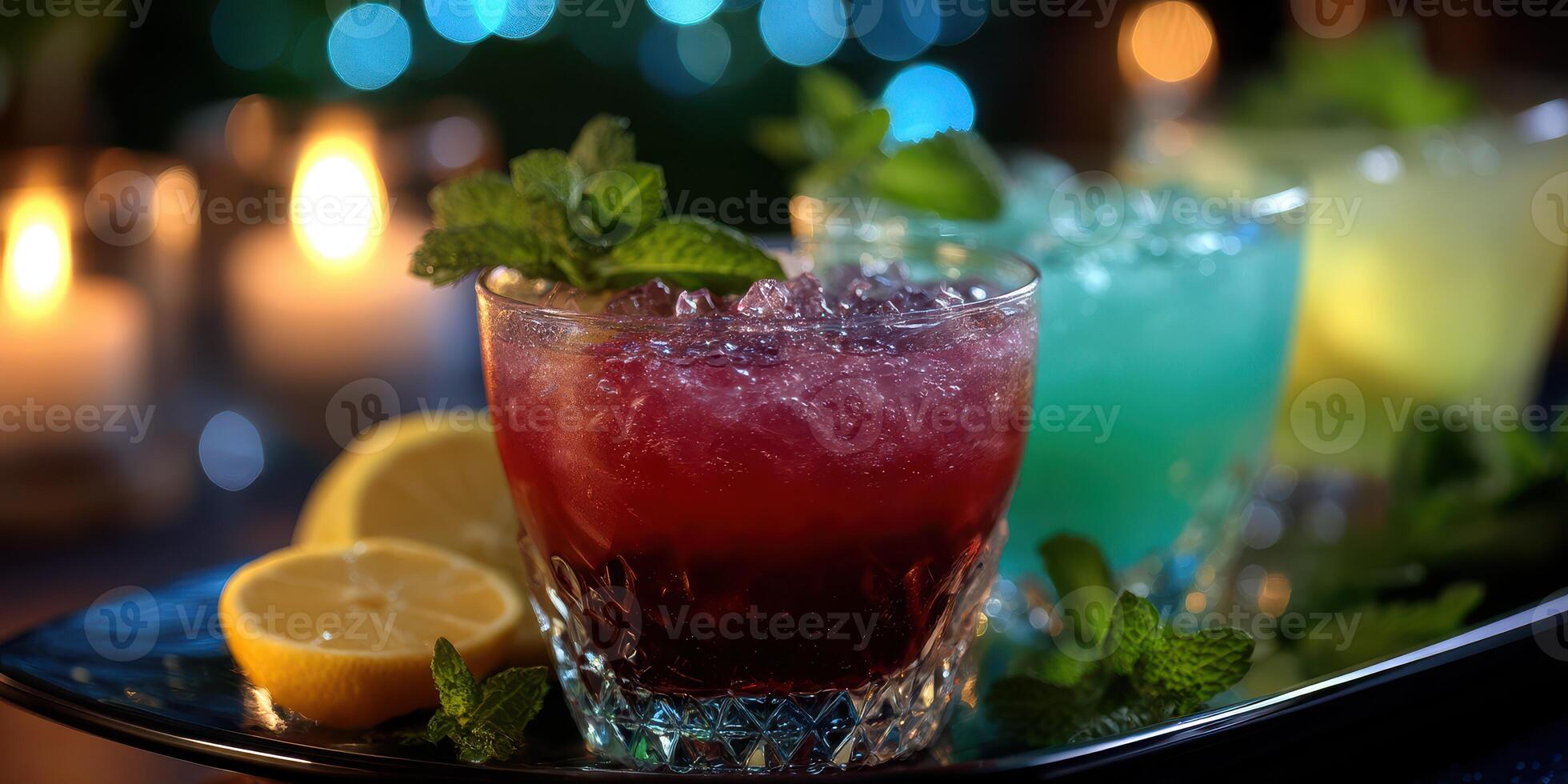 Refreshing cocktails with mint and lemon garnishes at an evening gathering photo