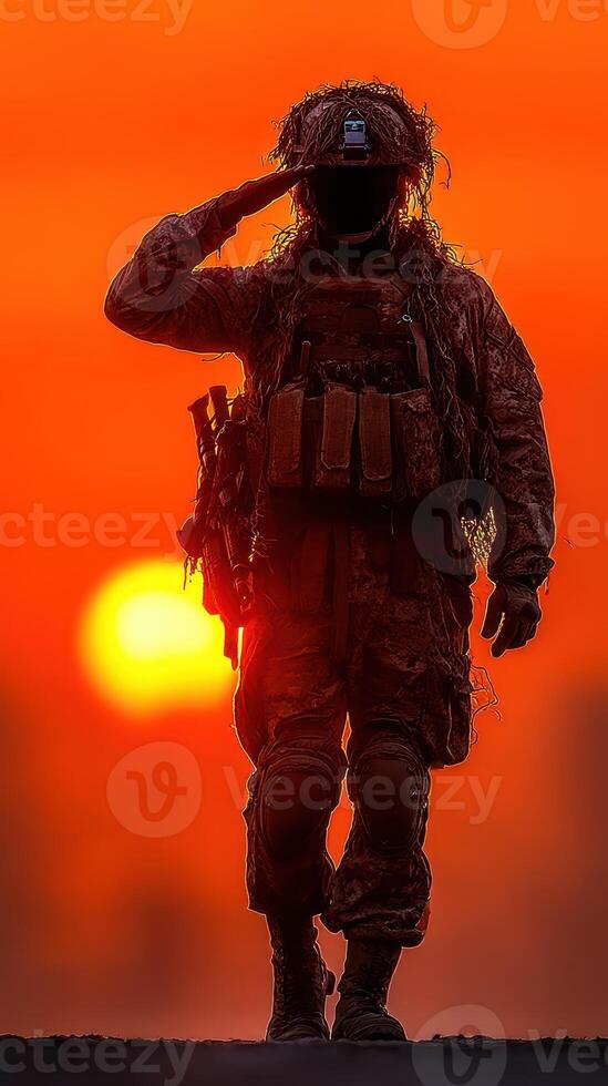 Soldier saluting during sunset while on duty in an outdoor training environment photo
