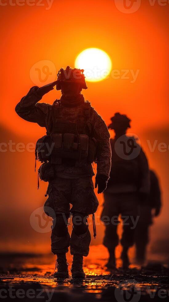 Soldiers salute at sunset during a military march in a desert environment photo