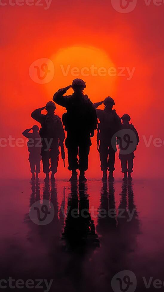 Soldiers saluting the sunset during a military training exercise in a desert location photo