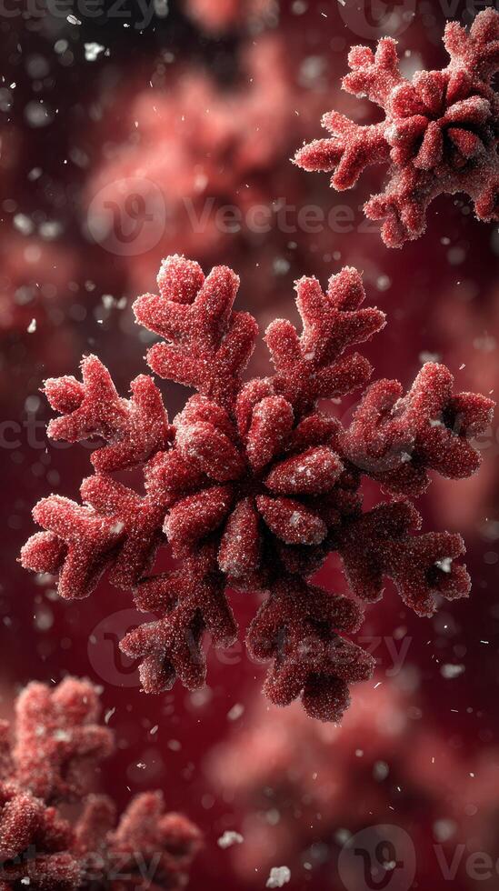 Detailed view of a vibrant red snowflake amidst soft falling snow in a winter wonderland setting photo