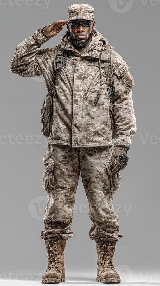 Soldier in tactical gear saluting with professionalism in a neutral background during a military training exercise photo
