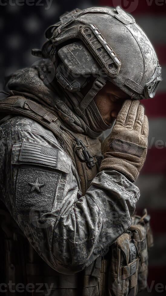 Soldier in tactical gear saluting with respect against a backdrop of the American flag photo