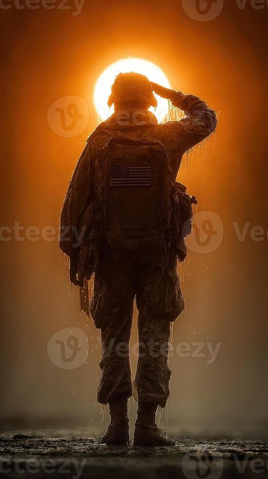 Soldier saluting against a dramatic sunset highlighting courage and dedication in military service photo